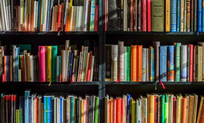 books in black wooden book shelf