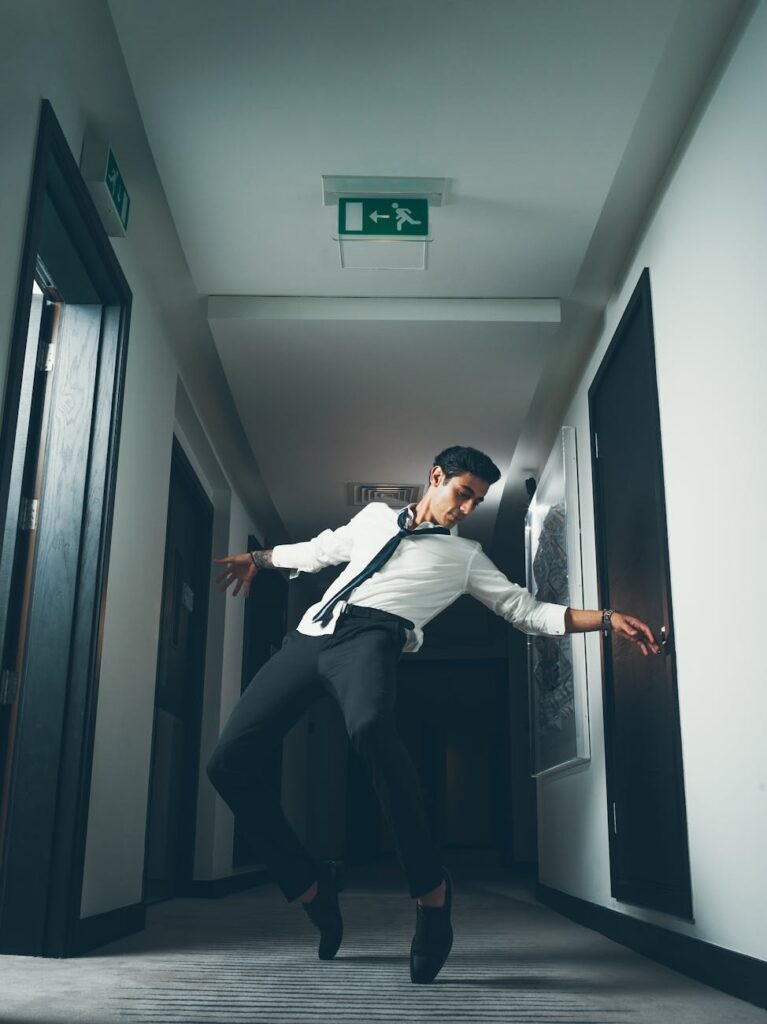 man break dancing on hallway