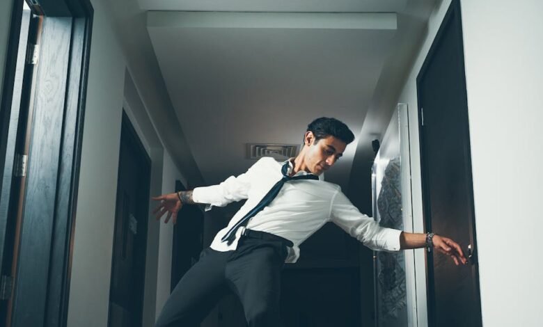 man break dancing on hallway