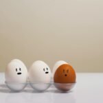 eggs in tray on white surface