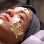 woman with mask on face at beautician