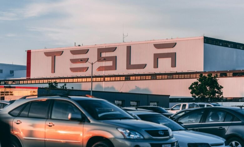 cars parked in front of company building