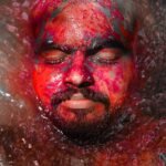 man underwater with face shown