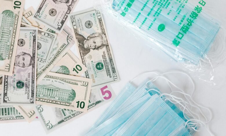 set of american cash money and medical facial masks