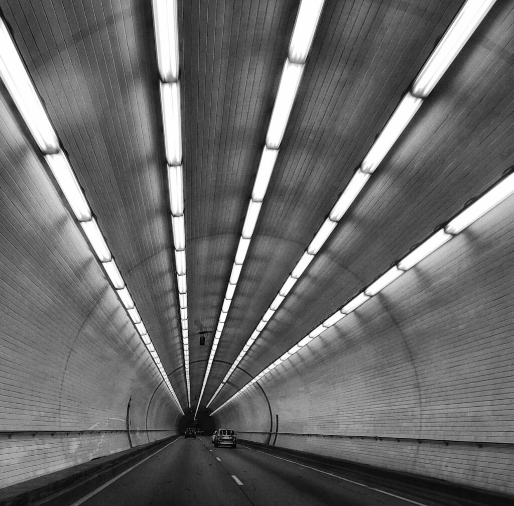 cars driving in tunnel