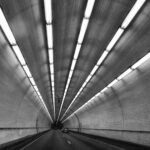 cars driving in tunnel