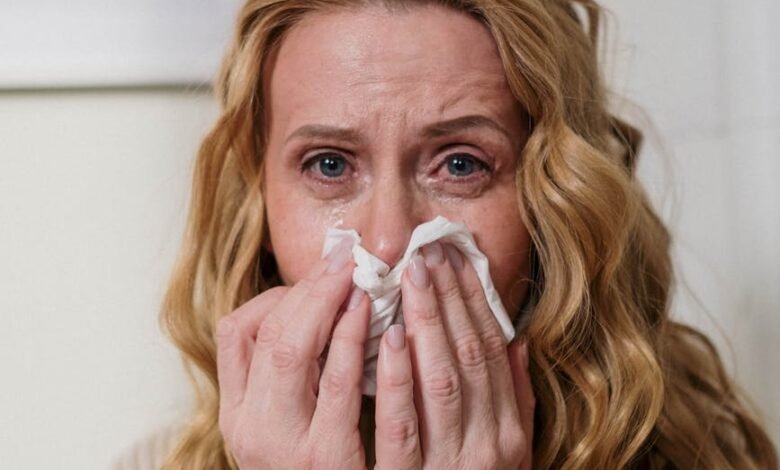 woman suffering from her allergy