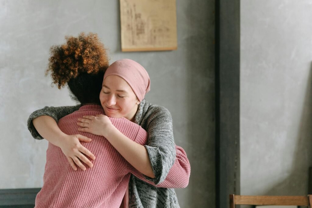 women hugging each other