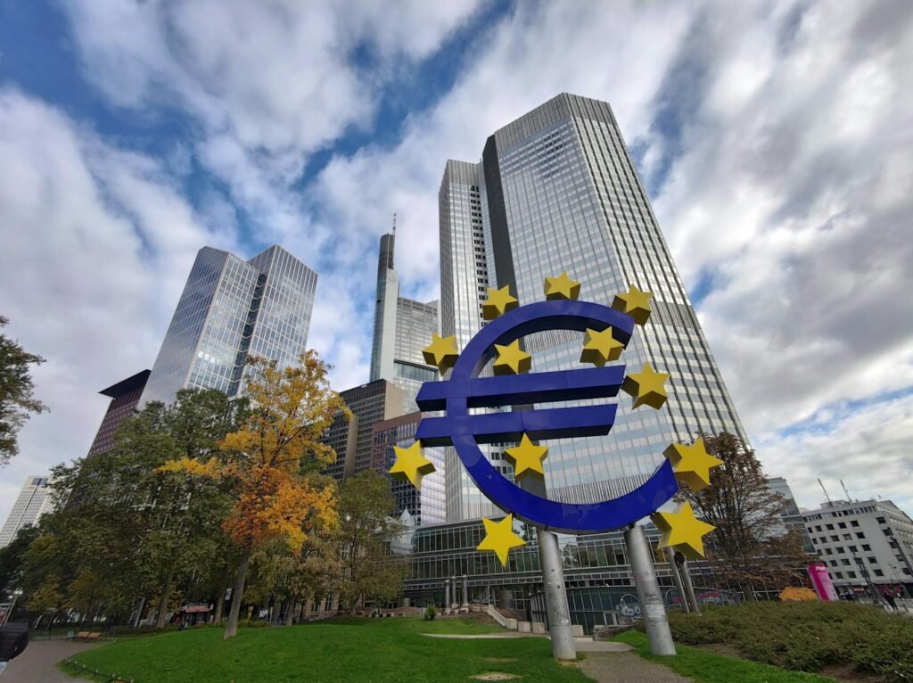 euro currency monument in front of bank buildings