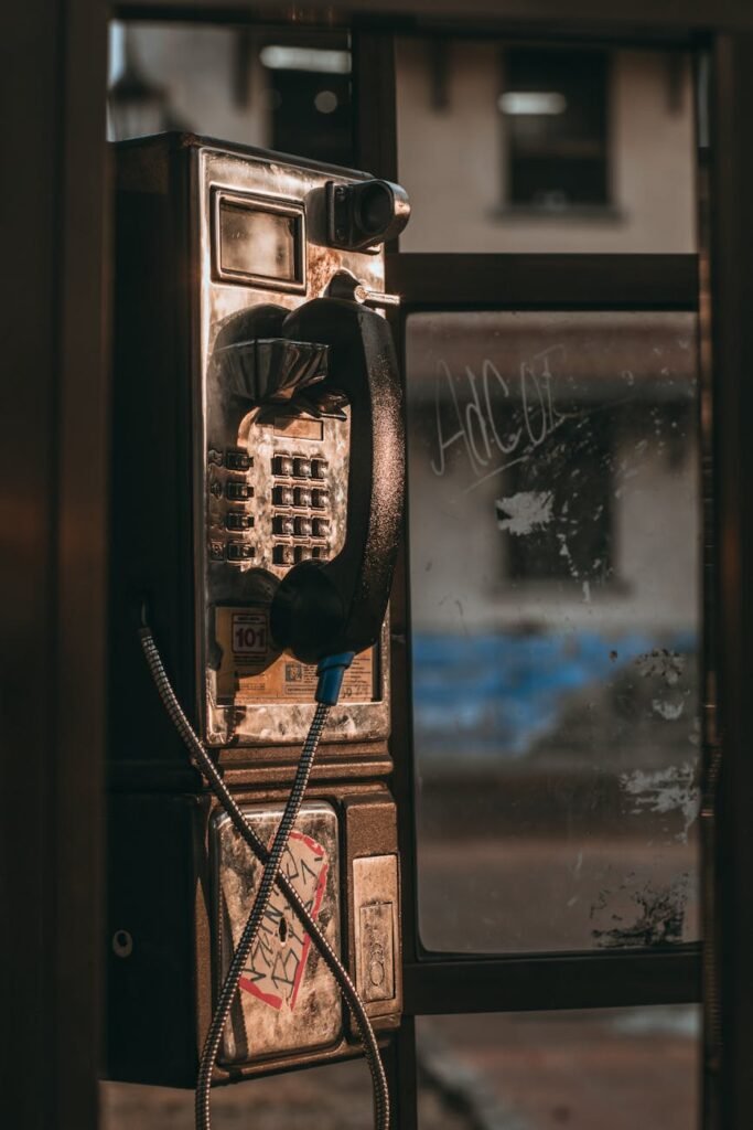 black and gray telephone booth