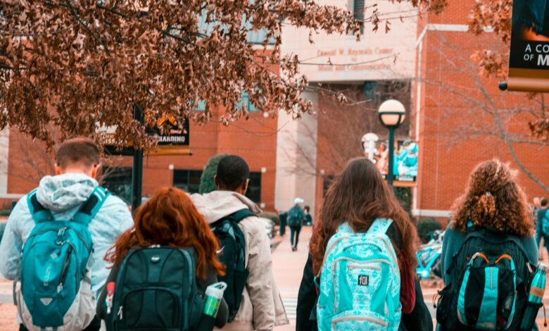 people wearing backpacks