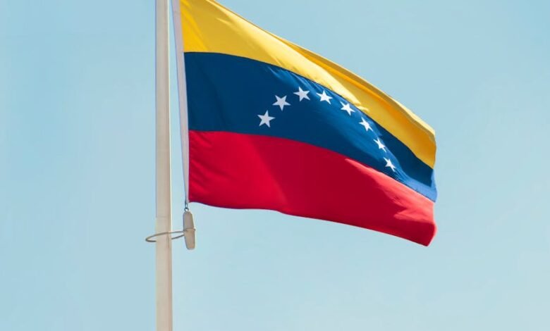 the flag of venezuela on a flag pole