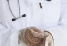 crop doctor with stethoscope preparing for surgery in hospital