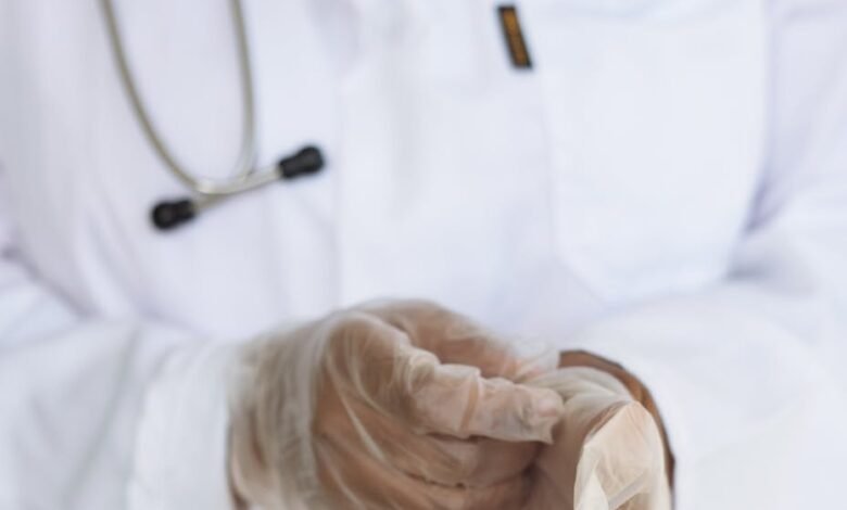 crop doctor with stethoscope preparing for surgery in hospital