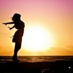 lady in beach silhouette during daytime photography